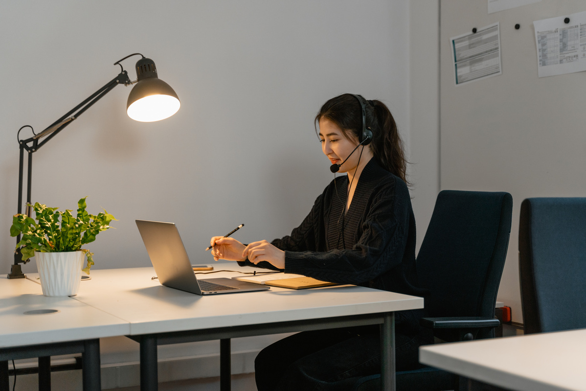 A Woman Working in Customer Support 